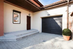 What is the cheapest way to replace a garage door