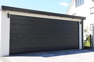 Why does my garage door go down 2 feet then back up